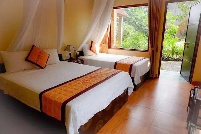 Triple Bungalow with River View Interior at Tam Coc Bungalow